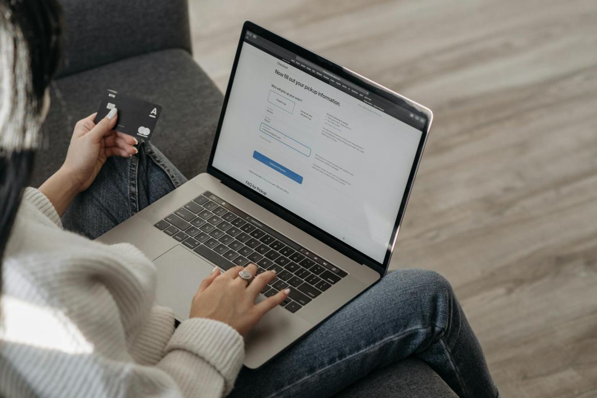 Woman making a payment on a laptop