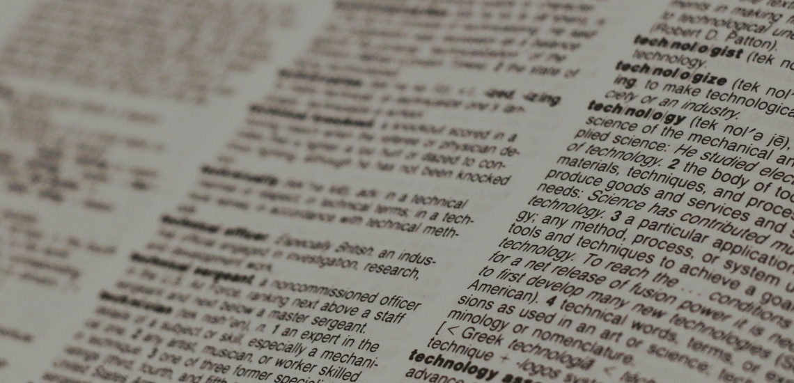 A dictionary opened to a definitions page